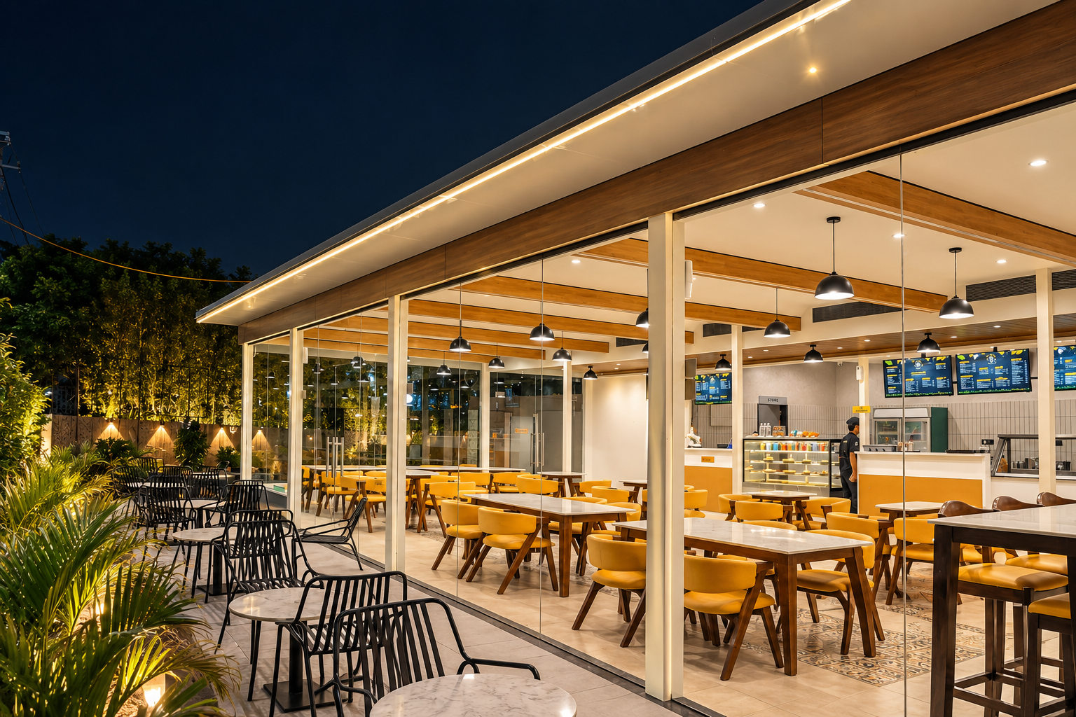 Taco Bell seating area under a lit ceiling